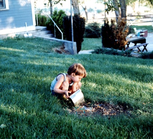 1973 Sep Scott watering a plant
